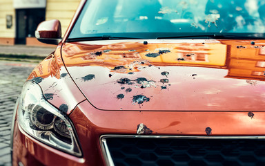 Fototapeta na wymiar Car Covered in Bird Droppings