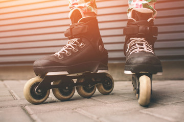 roller skates outdoors. Summer lifestyle portrait