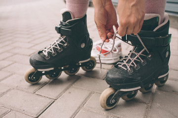 roller skates outdoors. Summer lifestyle portrait