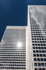 A building with lots of windows reflecting in the sun