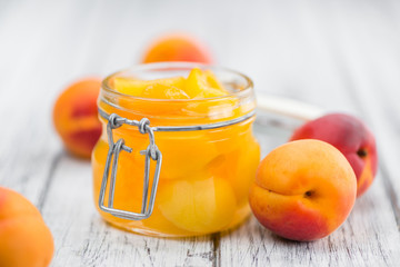 Pickled Apricots (selective focus) on vintage wooden background