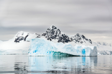 Icebergs, glaciers and mountains along the Antarctic Peninsula.