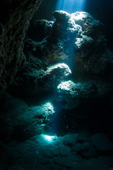 Fototapeta na wymiar Sun Light into the Underwater Cave