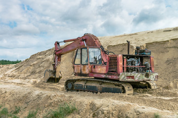 Fototapeta premium Sand quarry sand pit digger summer light 