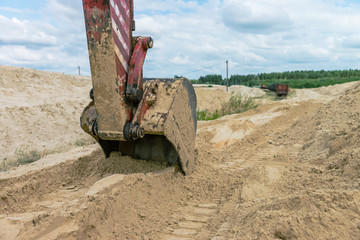 Sand quarry sand pit digger summer light 