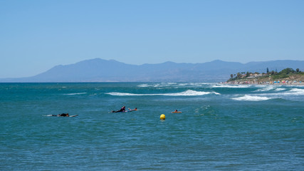 CABO PINO, ANDALUCIA/SPAIN - JULY 2 : People Surfing at Cabo Pino Andaluc&iacute;a Spain on July 2, 2017. Unidentified people.