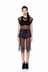 Full Length Tan Skin Asian Woman in sport bra, short jean and black net dress and high heels