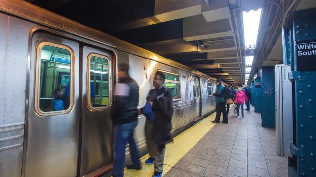 New York city subway time-lapse, showing the loading and unloading of passenger trains arriving and departing at station