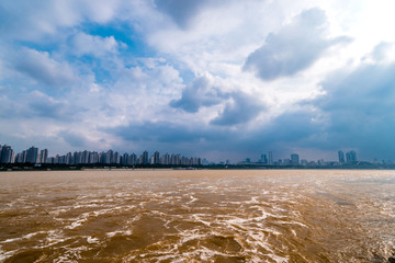 Time lapse. Landscape of the Han River in South Korea where the river turns into ocher after a lot of rain.
