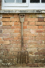 Beautiful old vintage potting shed exterior detail in English countryside garden