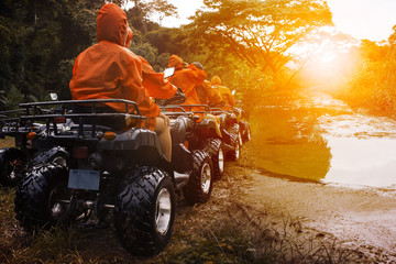 atv sport vehicle team ready to adventure in mud track © stockphoto mania