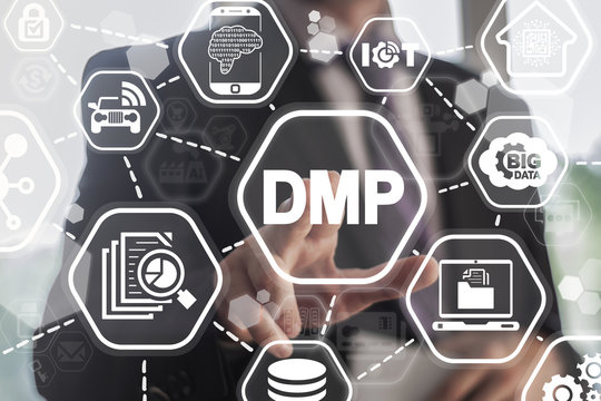 Data Management Platform, Future Marketing and CRM concept. Business man presses DMP button on virtual touch screen.