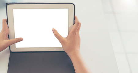 woman hand is holding touch screen tablet