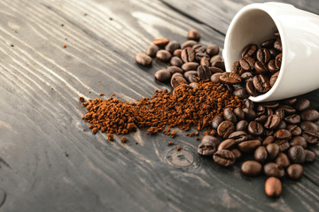 morning coffee bean and cup top on wood