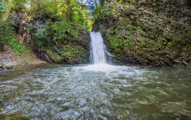 Beautiful small waterfall in the Ukrainian Carpathians