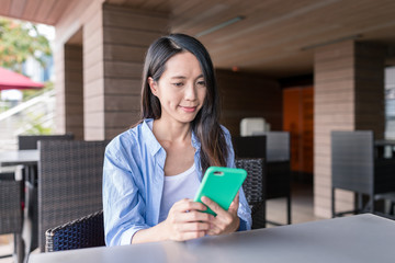 Woman use of mobile phone