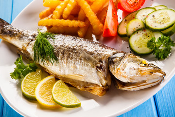 Fish dish - fried fish fillet with vegetables 
