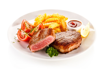 Grilled beefsteak with french fries on white background 