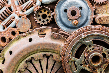 Fototapeta na wymiar old worn out rusty details of industrial machine