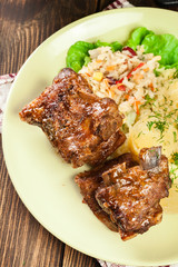 Pork spare ribs served with mashed potatoes and sauce