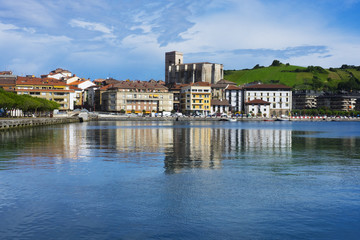 Fototapeta na wymiar Village of Zumaia reflected in water, Euskadi