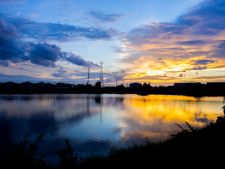 Fototapeta na wymiar Golden cloud and river on twilight times