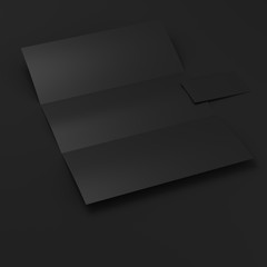 black folded paper and visit card