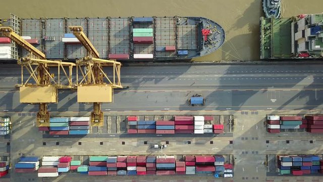 4K Aerial view of Industrial port with containers ship