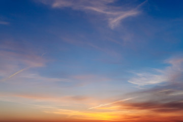 Sunset sky with clouds, background.