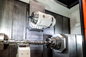 Closeup shot of the machine tool in factory hall.