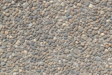 Small stone with cement background