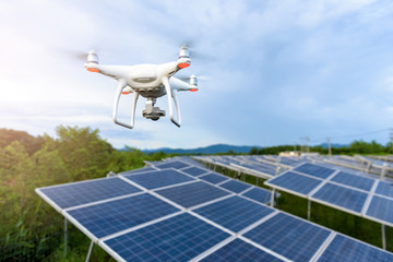 Drones flying over solar cells