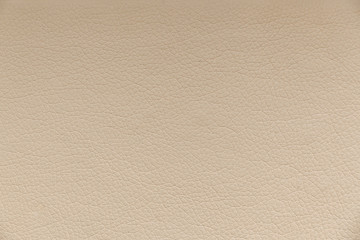 Texture of beige leather, background.