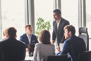 Group of business people with businessman leader on foreground