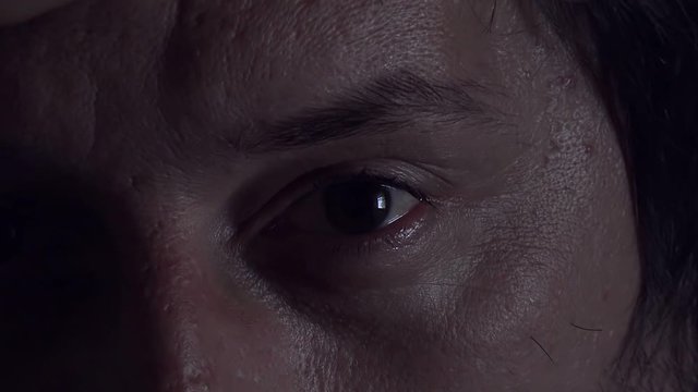 Morning depression and midlife crisis of a man in his 40s lying in bed in morning with symptoms like extreme sadness, frustration, anger and fatigue.