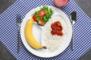 Serving tray with delicious food on table. Concept of school lunch