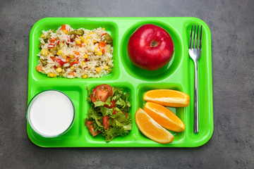 Serving tray with delicious food on table. Concept of school lunch