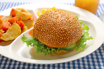 Serving tray with delicious food, closeup. Concept of school lunch