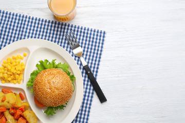 Serving tray with delicious food on table. Concept of school lunch