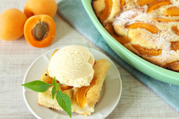 Homemade rustic apricot cake with ice cream