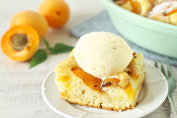 Homemade rustic apricot cake with ice cream