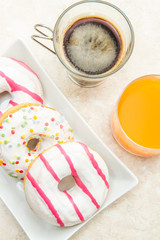 tablee with donuts and brioche breakfast
