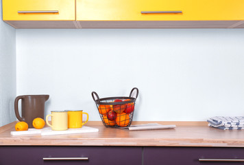 Composition with fruits on counter in kitchen