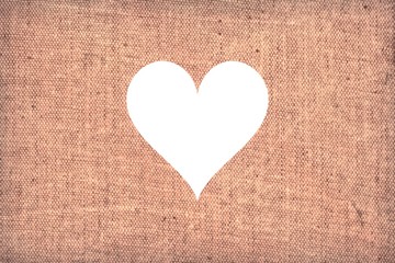 Light pastel pink canvas background with cut out heart shape in the middle, wedding romantic concept