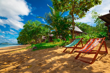 Thailand. Sea, sunbed, palms