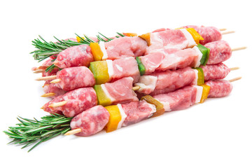 Group of meat skewers with rosemary
