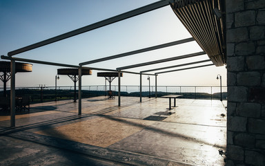Empty terrace at sunset