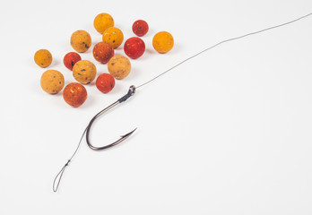 Carp hook boilies on the white background . CloseUp . - 164454308
