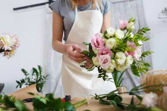 Image of florist making bouquet