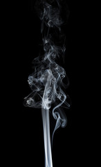 White smoke on black background.